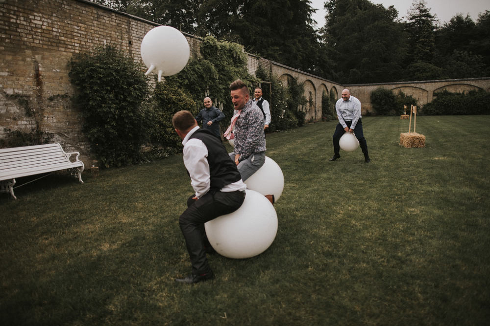 Outdoor Farm Field Wheat Rustic Garden Marquee Space Hopper Games | Fun and Relaxed Scrivelsby Walled Garden Wedding Brook Rose Photography