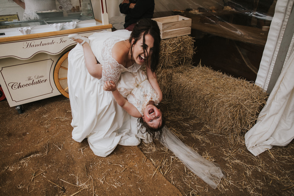 Outdoor Farm Field Wheat Rustic Garden Marquee Bell Tents Bride Ice Cream Hay Bale | Fun and Relaxed Scrivelsby Walled Garden Wedding Brook Rose Photography