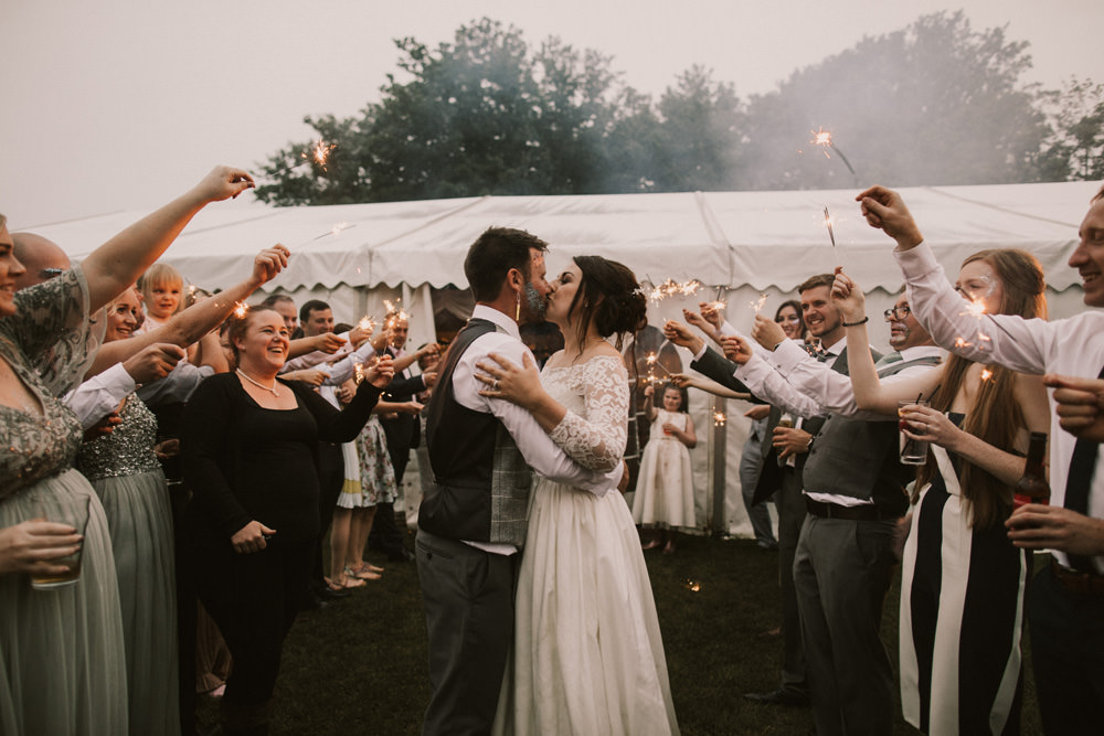 Outdoor Farm Field Wheat Rustic Garden Marquee Bride Groom Glitter Sparkler Tunnel | Fun and Relaxed Scrivelsby Walled Garden Wedding Brook Rose Photography