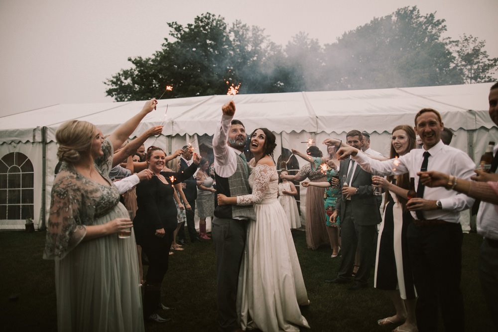 Outdoor Farm Field Wheat Rustic Garden Marquee Bride Groom Glitter Sparkler Tunnel | Fun and Relaxed Scrivelsby Walled Garden Wedding Brook Rose Photography