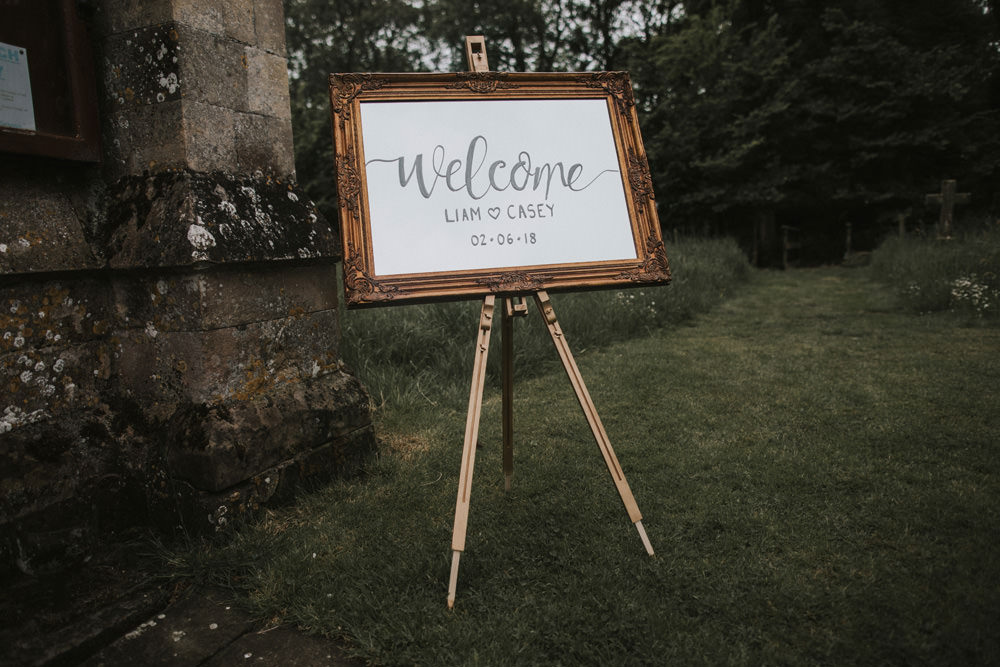Outdoor Farm Field Rustic Garden Marquee Welcome Sign Gold Frame Easel | Fun and Relaxed Scrivelsby Walled Garden Wedding Brook Rose Photography