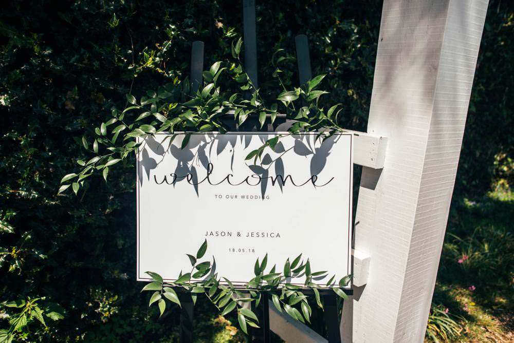 Modern Calligraphy Sign Welcome Greenery Warm Welcoming Wedding Three Flowers Photography