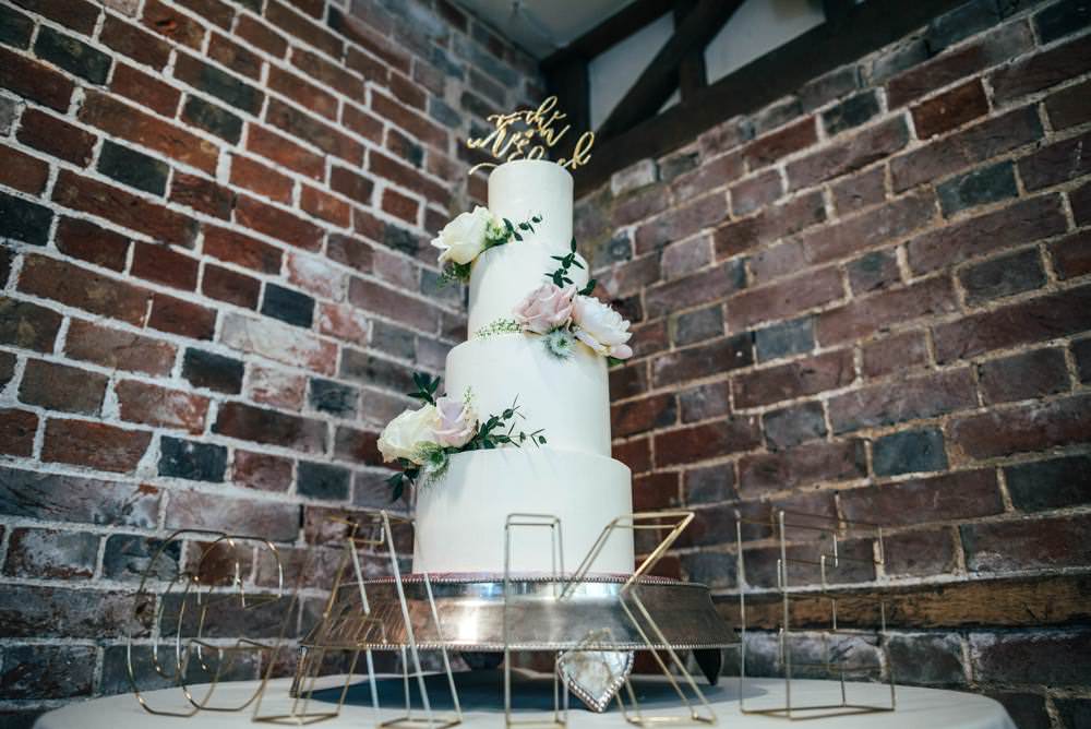 Tall Iced Cake Modern Flowers Wire Sign Warm Welcoming Wedding Three Flowers Photography