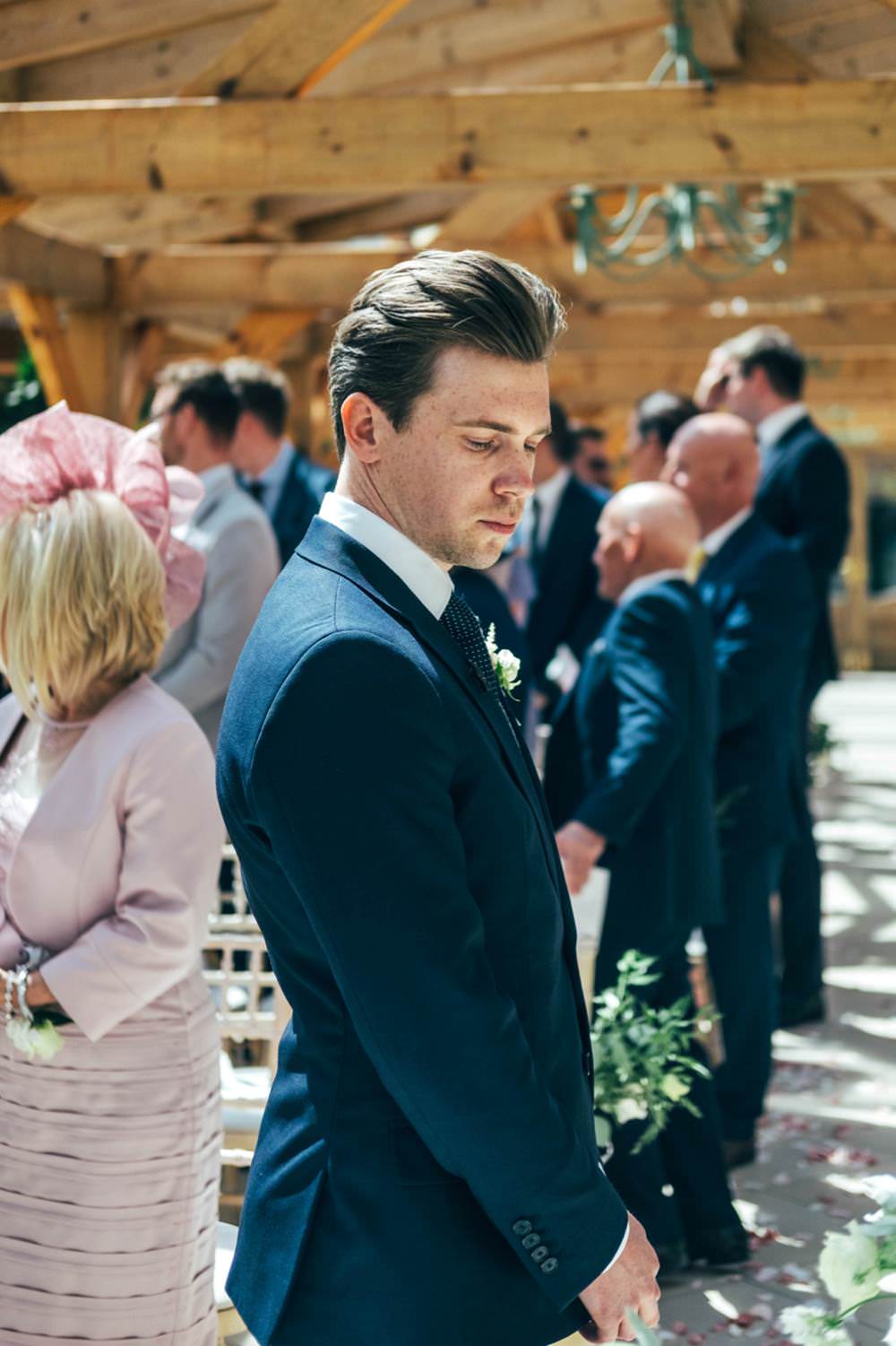 Groom Suit Navy Blue Groomsmen Polka Dot Tie Warm Welcoming Wedding Three Flowers Photography