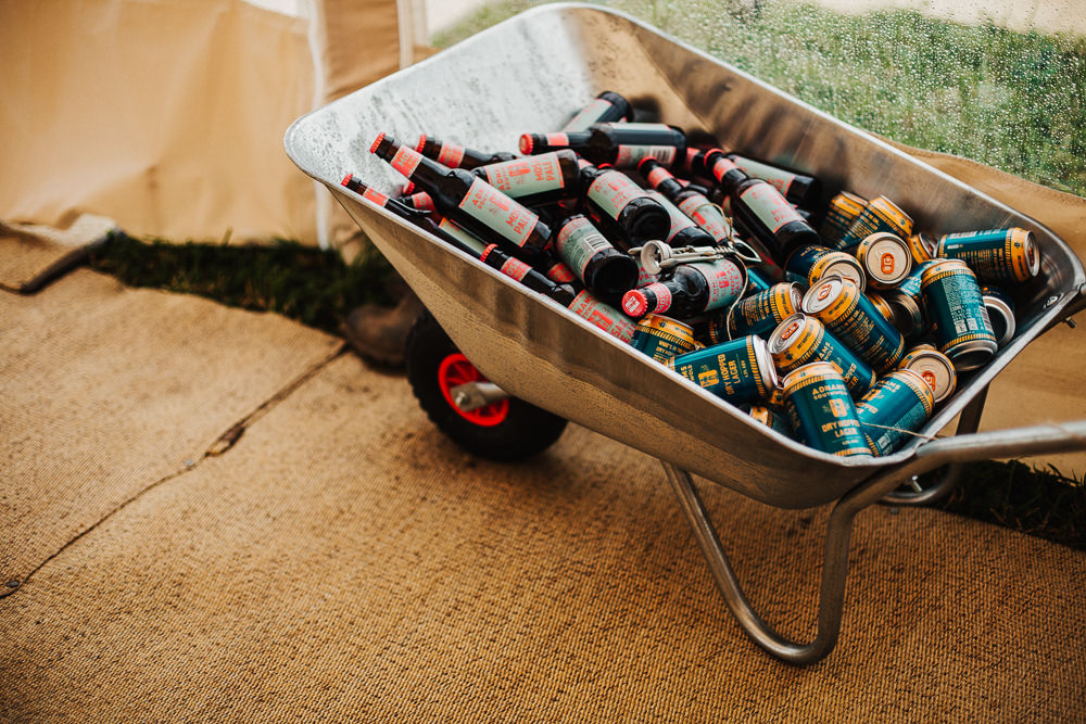 Drinks Wheelbarrow Beers Whimsical Countryside Sperry Tent Wedding Emilie May Photography