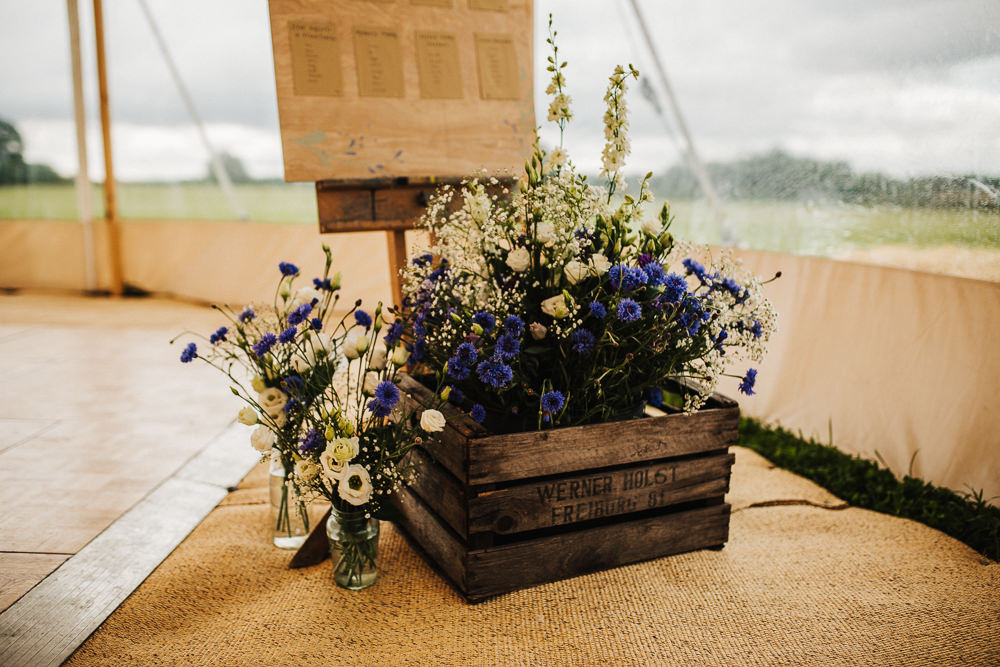 Wooden Crate Floral Flowers Blue Purple Gypsophila Table Plan Entrance Whimsical Countryside Sperry Tent Wedding Emilie May Photography