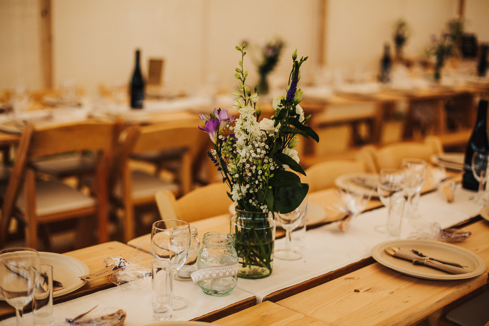 Jam Jar Flower Arrangements Gypsophila Purple Whimsical Countryside Sperry Tent Wedding Emilie May Photography