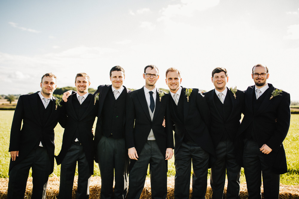 Groom Groomsmen Tails Morning Suit Whimsical Countryside Sperry Tent Wedding Emilie May Photography