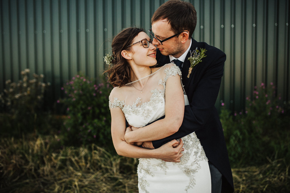 Bride Bridal Enzoani Fitted Wedding Dress Embellished Cap Sleeve Gypsophila Groom Tails Whimsical Countryside Sperry Tent Wedding Emilie May Photography