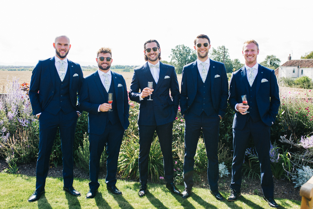 Groom Groomsmen Check Suits Navy Floral Bow Tie Wray's Barn Whinstone View Wedding Sally T Photography