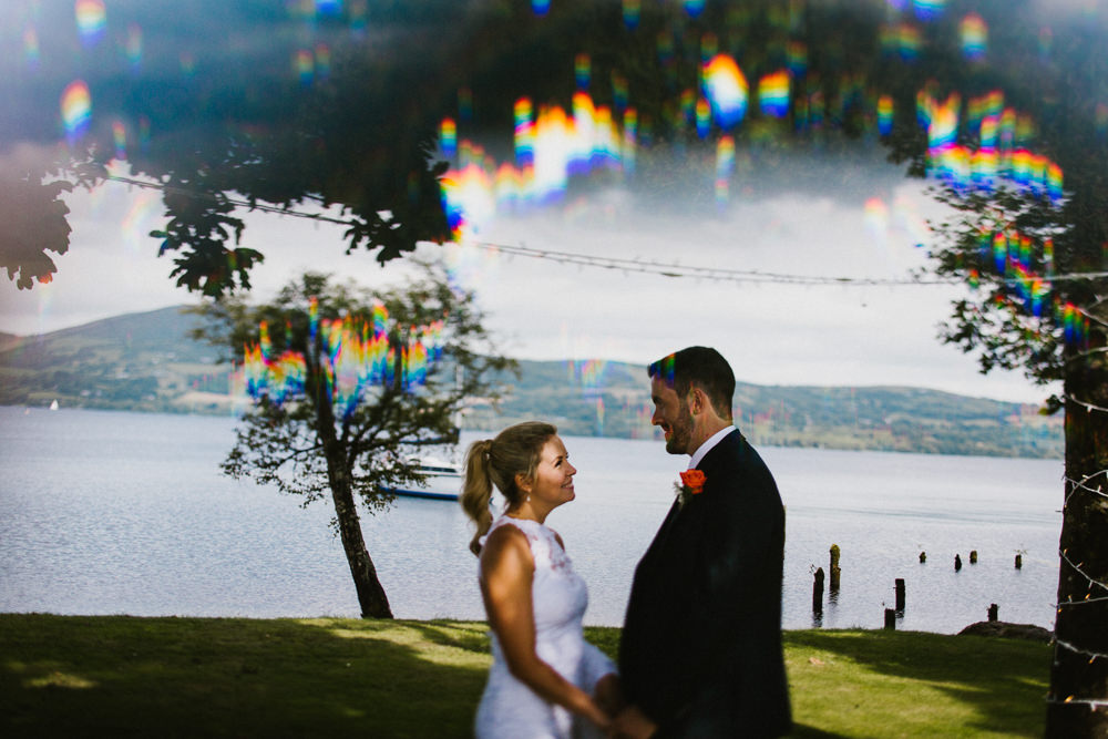 Bride Bridal Grace Loves Lace Dress Halter Neck Long Train Short Front Asymmetric Three Piece Navy Suit Groom Multicoloured Bouquet Anna Carriga Wedding Honey and the Moon Photography