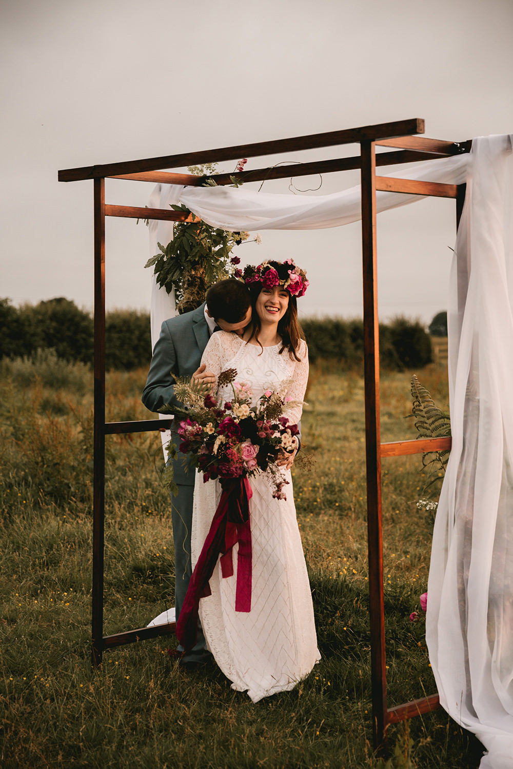 Flower Arch Backdrop Flowers Dark Red Burgundy Marsala Oxblood Pink Magenta Fabric Wooden Peony Peonies Rose Antique Moody Floral Farm Wedding Ideas Jemma King Photography