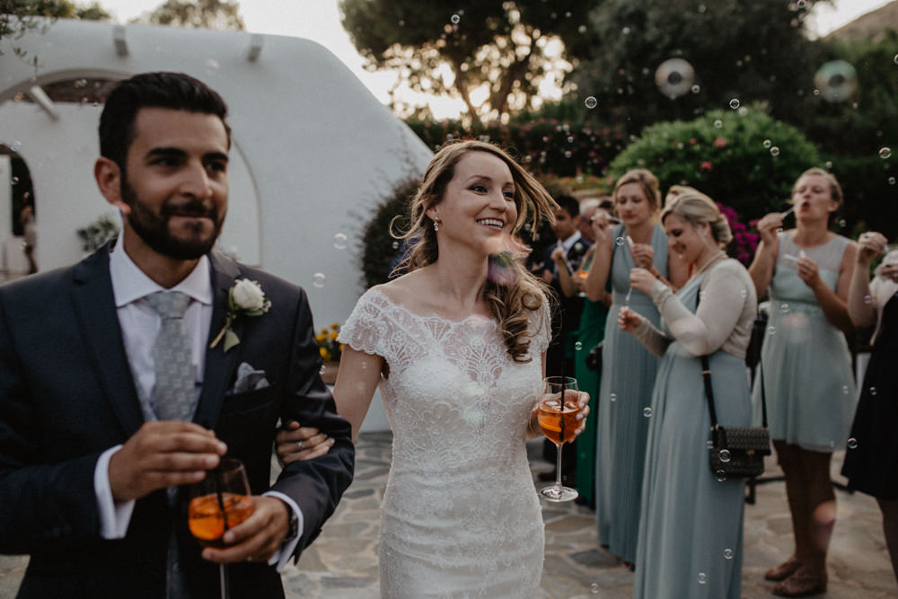 Bride Bridal Fishtail Lace Cap Sleeve Sweetheart Dress Gown Grey Suit Groom Aperol Bubbles Greece Destination Wedding Elena Popa Photography