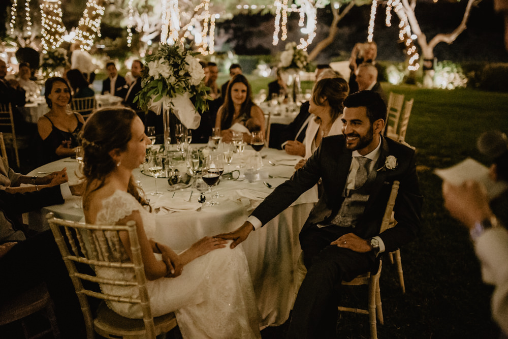 Bride Bridal Fishtail Lace Cap Sleeve Sweetheart Dress Gown Groom Dark Grey Waistcoat Fairy Lights Tree Greece Destination Wedding Elena Popa Photography