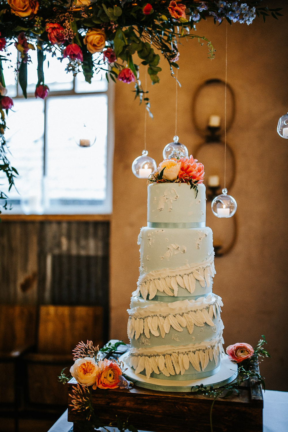 Cake Tall Tiers Blue Feathers Candles Flowers Holmes Mill Wedding Emilie May Photography