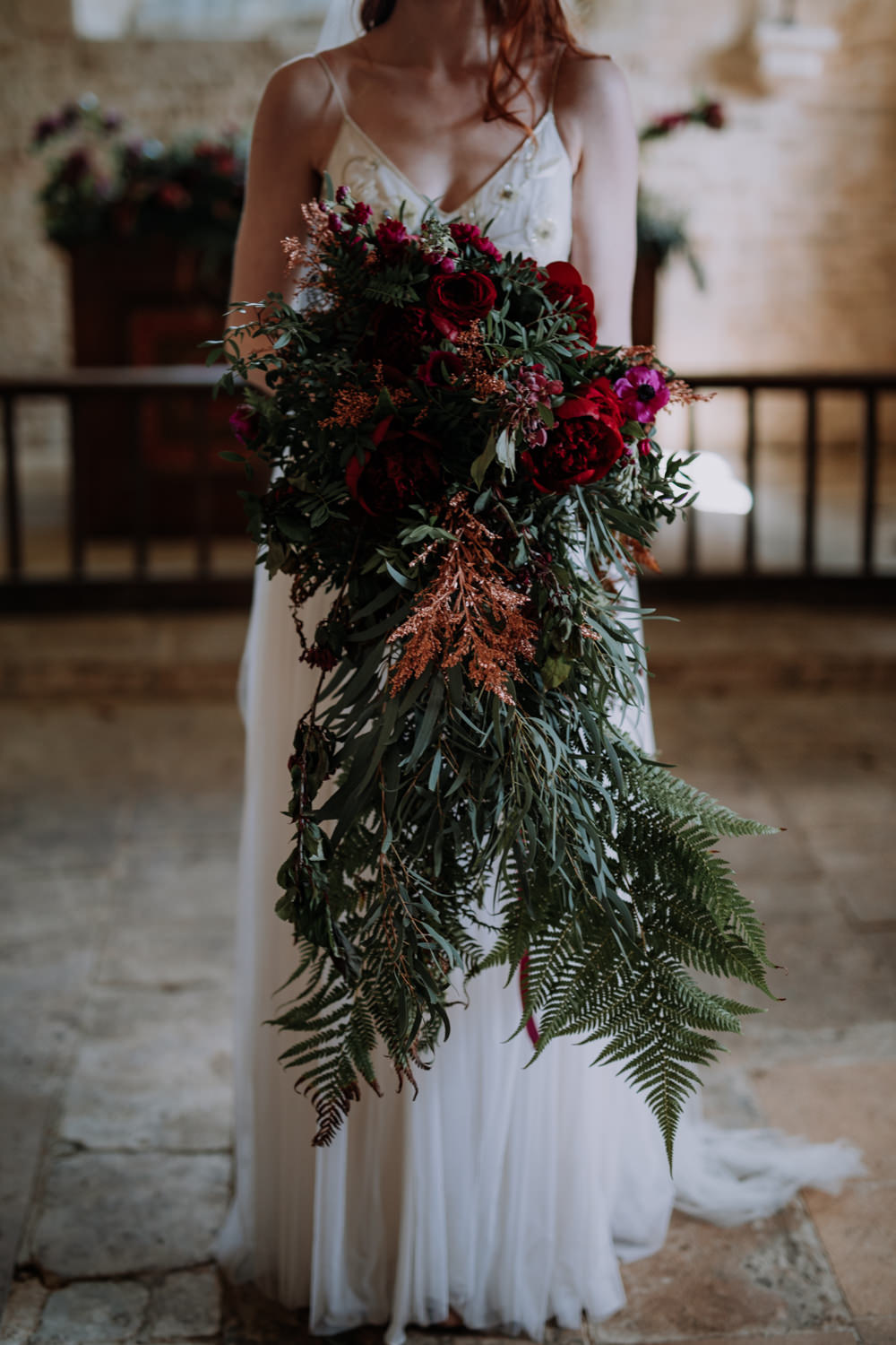 Bouquet Flowers Bride Bridal Large Cascading Oversized Greenery Foliage Burgundy Peony Peonies Ferns Industrial Luxe Wedding Ideas Balloon Installation Ayelle Photography