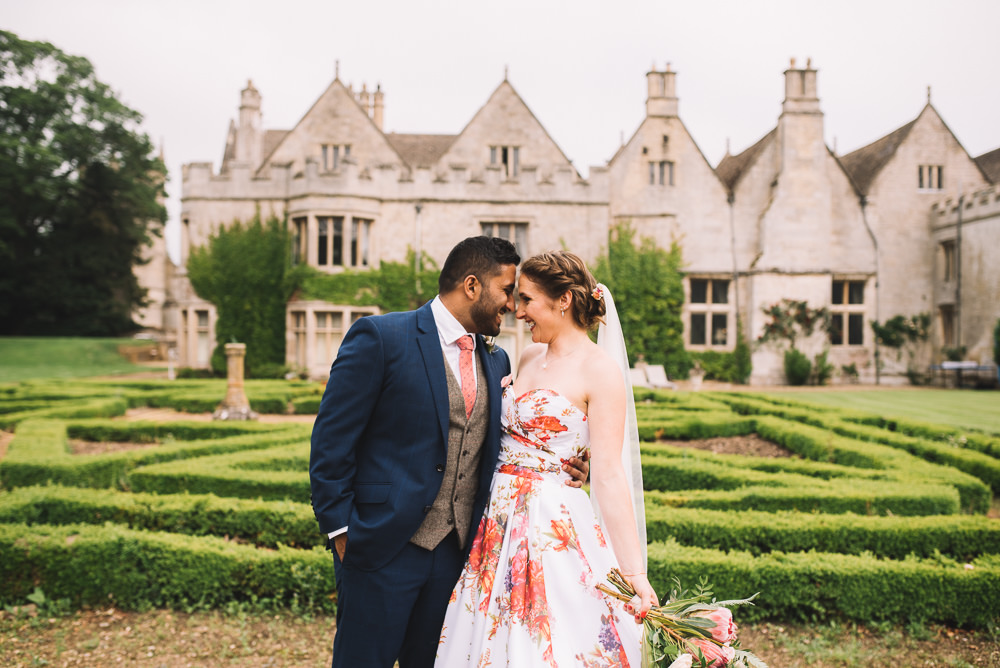 Groom Suit Waistcoat Coral Tie Navy Irnham Hall Wedding Lucie Watson Photography