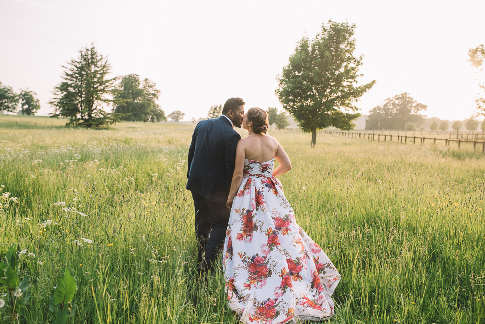 Bride Bridal Dress Gown Floral Flowers Print Pink Strapless Sweetheart Veil Irnham Hall Wedding Lucie Watson Photography