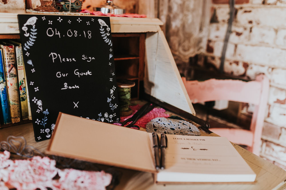 Keeper and The Dell Boho Farm Field Marquee DIY Alternative Rustic Vintage Books Guestbook Table Crochet | Relaxed Outdoor Wedding with 1000 Rainbow Origami Cranes Dan Biggins Photography