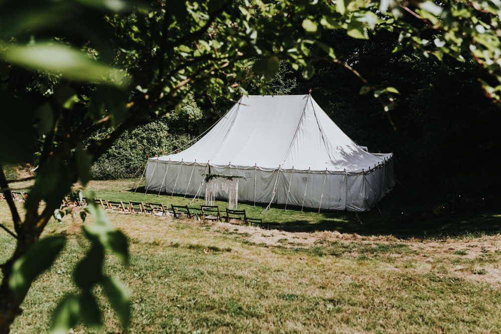 Keeper and The Dell Boho Farm Field Marquee DIY Alternative Rustic Outdoor Ceremony Arch Macrame Ivy | Relaxed Outdoor Wedding with 1000 Rainbow Origami Cranes Dan Biggins Photography