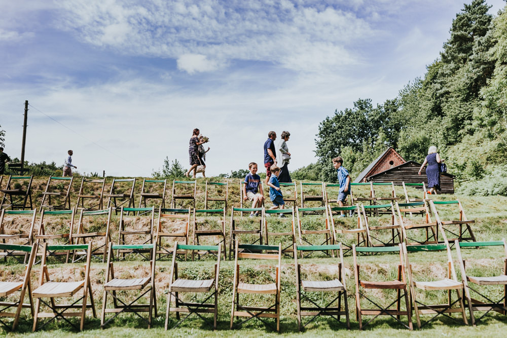Keeper and The Dell Boho Farm Field Marquee DIY Alternative Rustic Outdoor Ceremony Arch Macrame Ivy | Relaxed Outdoor Wedding with 1000 Rainbow Origami Cranes Dan Biggins Photography