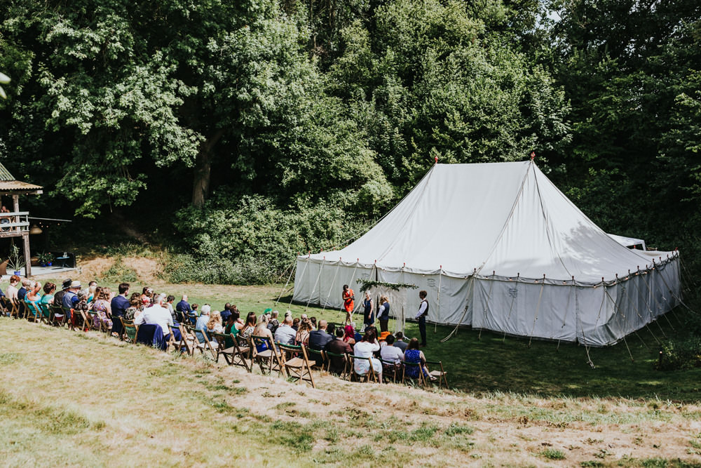 Keeper and The Dell Boho Farm Field Marquee DIY Alternative Rustic Outdoor Ceremony Arch Macrame Ivy | Relaxed Outdoor Wedding with 1000 Rainbow Origami Cranes Dan Biggins Photography