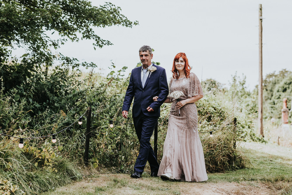 Keeper and The Dell Boho Farm Field Marquee DIY Alternative Rustic Outdoor Ceremony Bride Father Sequin Pink Dress Paper Rose Bouquet | Relaxed Outdoor Wedding with 1000 Rainbow Origami Cranes Dan Biggins Photography