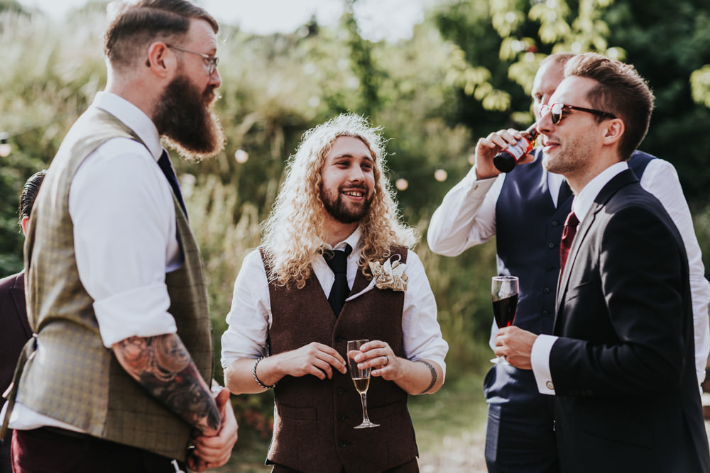 Keeper and The Dell Boho Farm Field Marquee DIY Alternative Rustic Groom Brown Suit Paper Rose Buttonhole | Relaxed Outdoor Wedding with 1000 Rainbow Origami Cranes Dan Biggins Photography