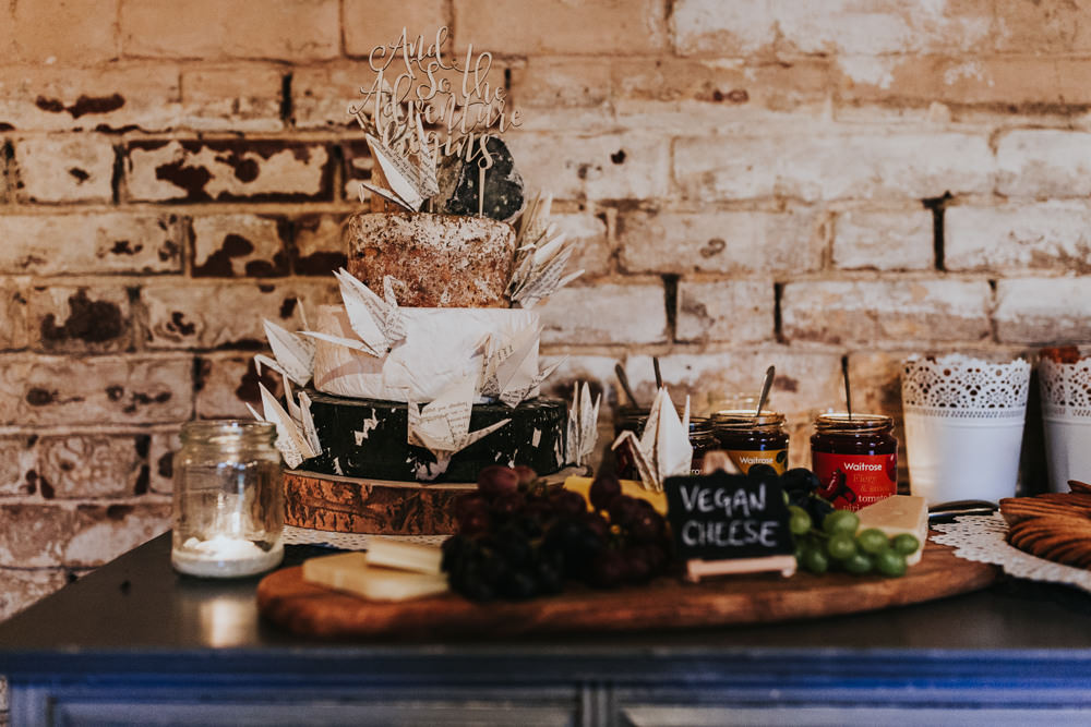 Keeper and The Dell Boho Farm Field Marquee DIY Alternative Rustic Cheese Tower Paper Origami Cranes Adventure Topper | Relaxed Outdoor Wedding with 1000 Rainbow Origami Cranes Dan Biggins Photography