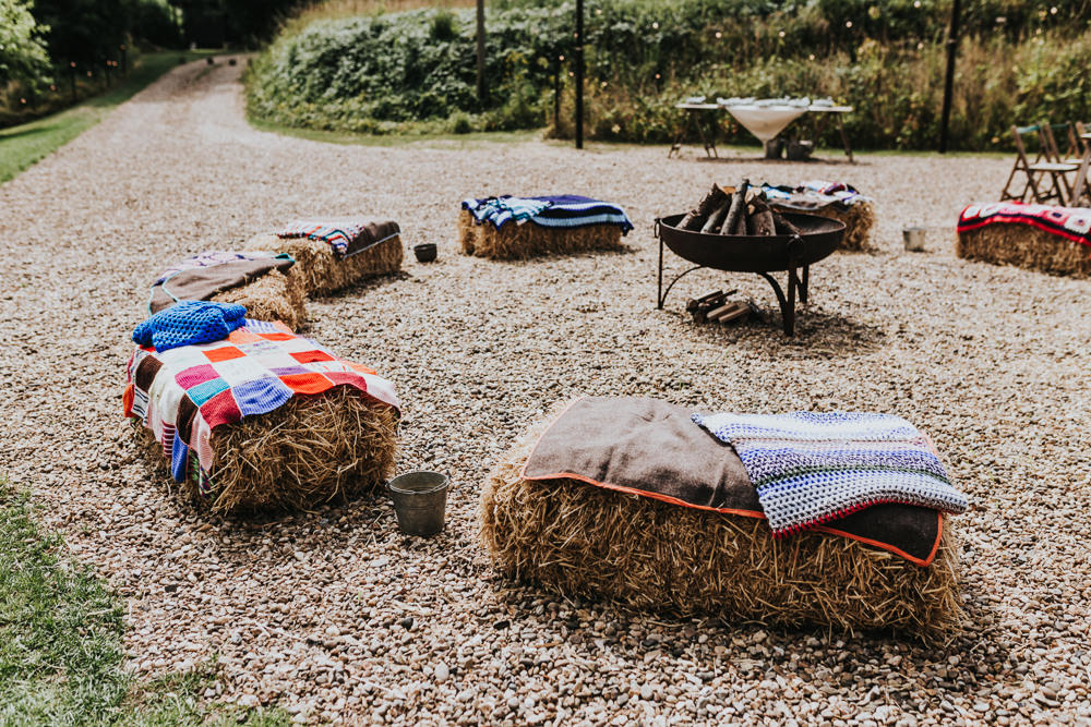 Keeper and The Dell Boho Farm Field Marquee DIY Alternative Rustic Hay Bales Fire Pit Blankets | Relaxed Outdoor Wedding with 1000 Rainbow Origami Cranes Dan Biggins Photography