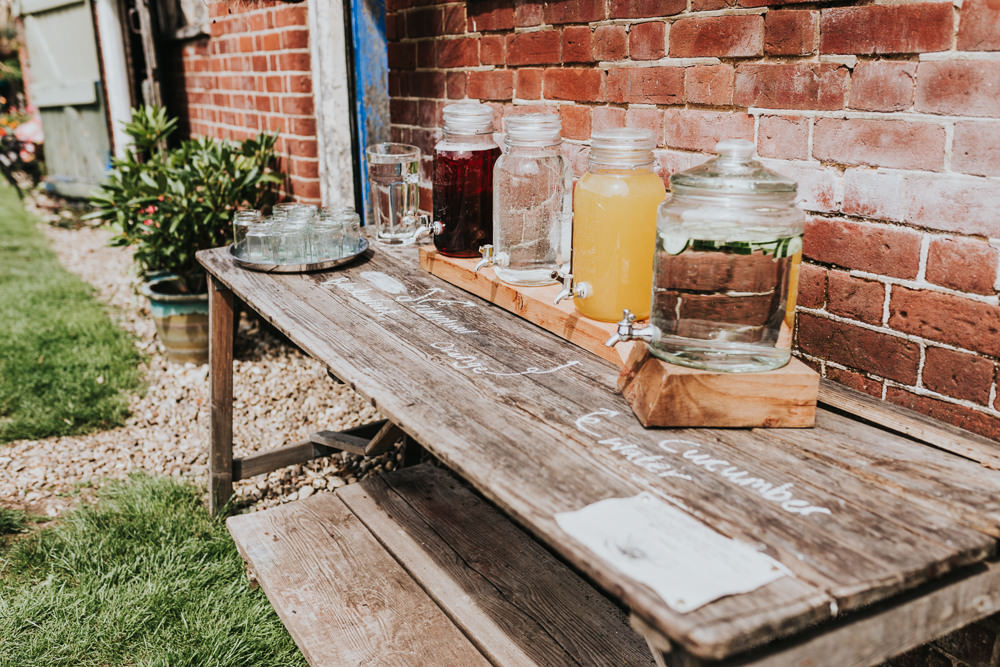 Keeper and The Dell Boho Farm Field Marquee DIY Alternative Rustic Drinks Station Cocktails Jugs Kilner | Relaxed Outdoor Wedding with 1000 Rainbow Origami Cranes Dan Biggins Photography