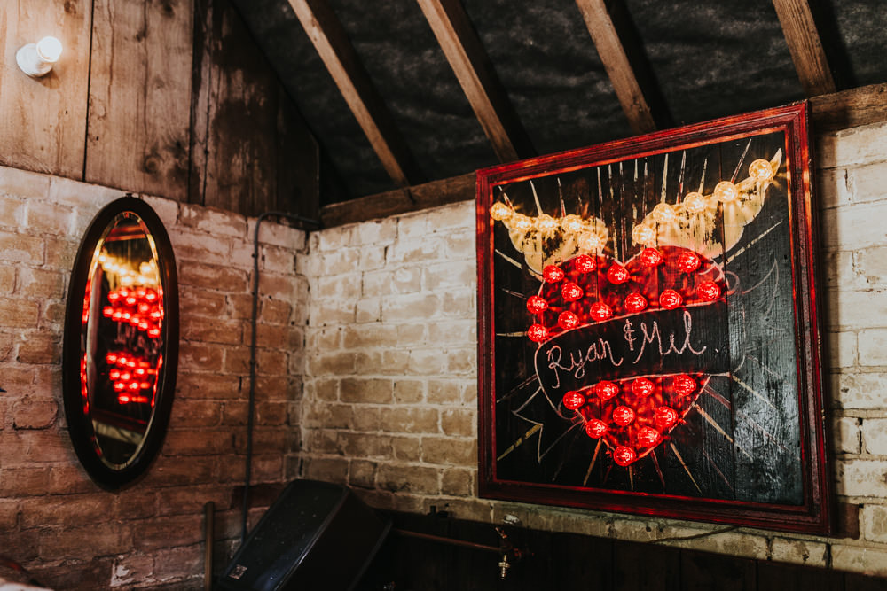 Keeper and The Dell Boho Farm Field Marquee DIY Alternative Rustic LED Lightbulb Sign Chalk Names | Relaxed Outdoor Wedding with 1000 Rainbow Origami Cranes Dan Biggins Photography