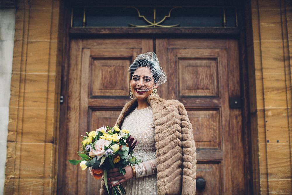 Bride Bridal Ivory Gold Indian Dress Embellished Long Sleeved Birdcage Veil Bouquet Fur Coat MC Motors Wedding LoveStruck Photography