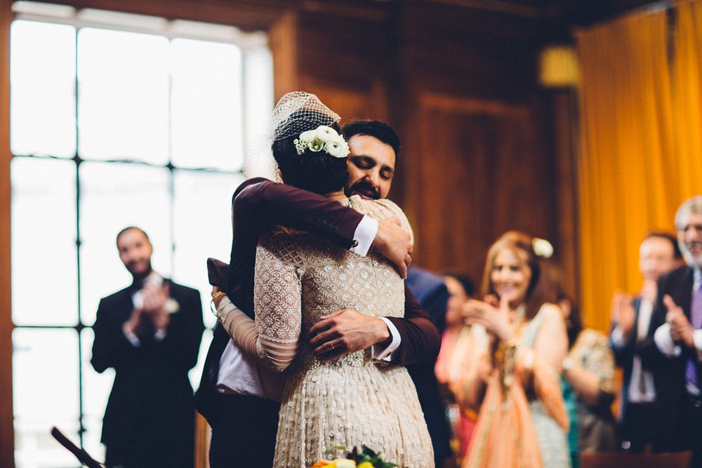 Bride Bridal Ivory Gold Indian Dress Embellished Long Sleeved Birdcage Veil Burberry Ox Blood Burgundy Suit Groom MC Motors Wedding LoveStruck Photography