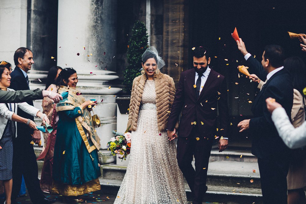 Bride Bridal Ivory Gold Indian Dress Embellished Long Sleeved Birdcage Veil Burberry Ox Blood Burgundy Suit Groom Fur Coat Confetti MC Motors Wedding LoveStruck Photography