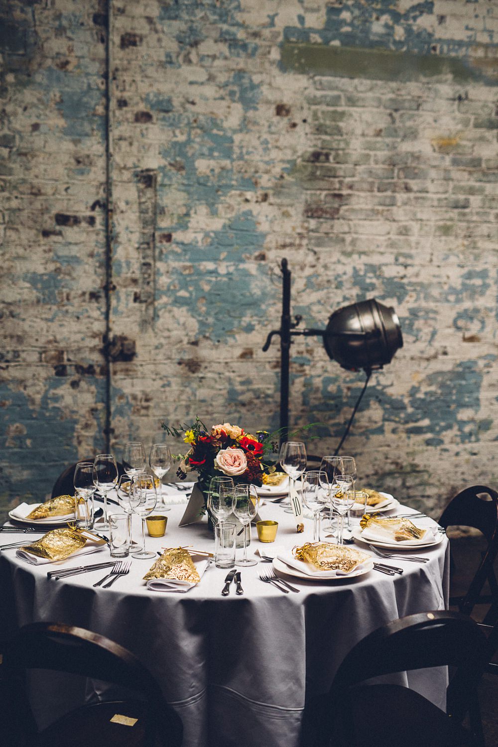 Warehouse Table Setting Multicoloured Flowers MC Motors Wedding LoveStruck Photography