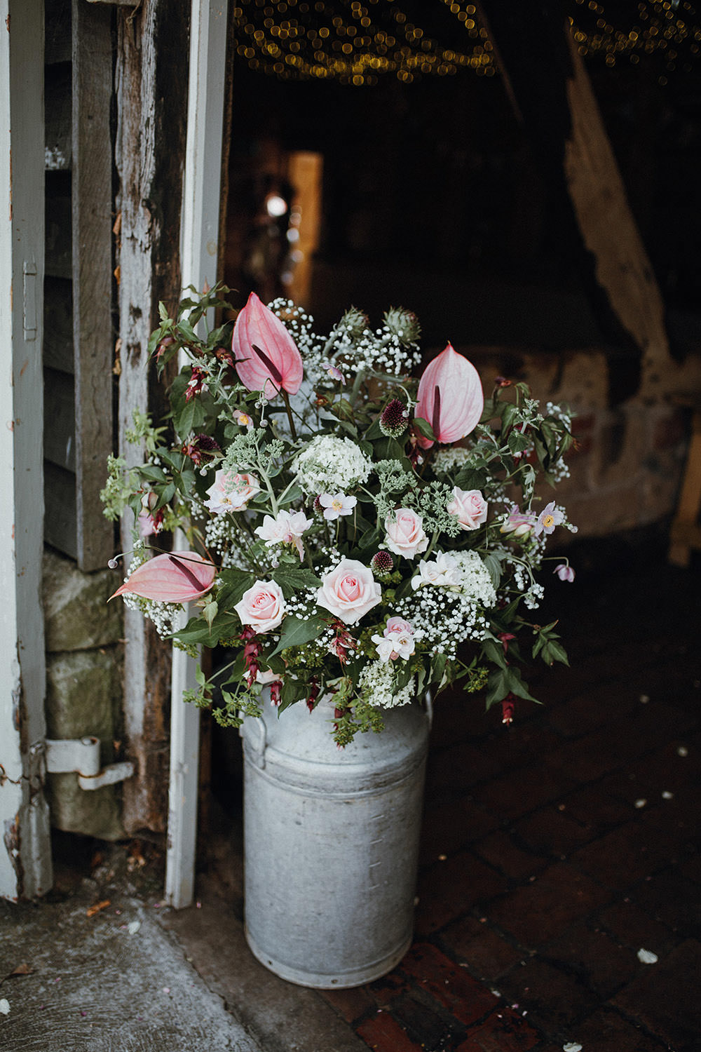 Milk Churn Flowers Pink Lilly Rose Greenery Gypsophila Pimhill Barn Wedding Shrophire Leah Lombardi Photography