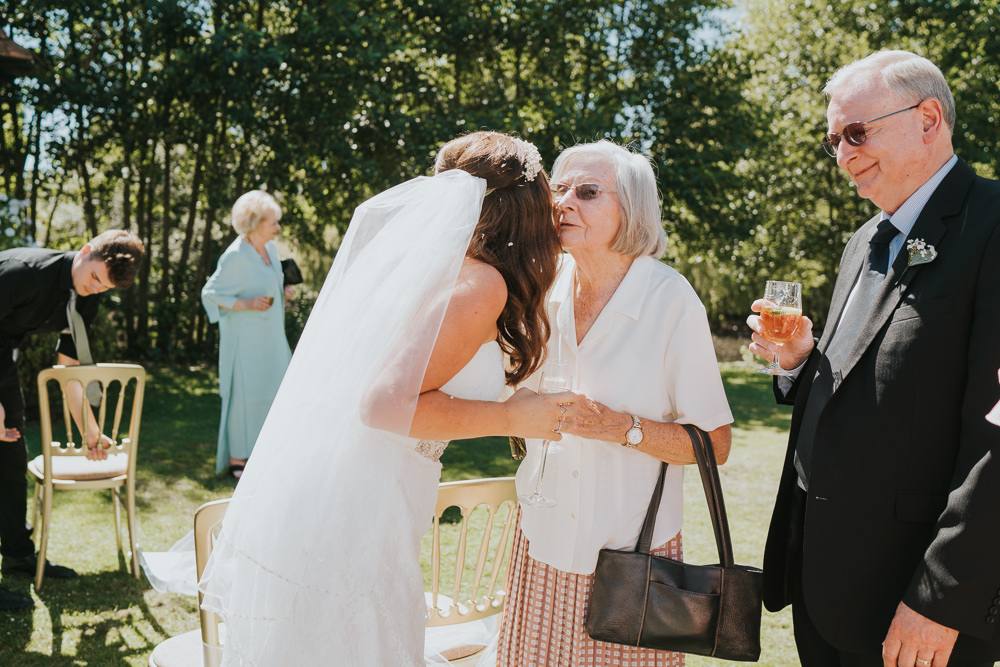 Intimate Outdoor Natural Relaxed Laid Back Summer Bride Veil Drinks Reception | Prested Hall Wedding Grace Elizabeth Photography