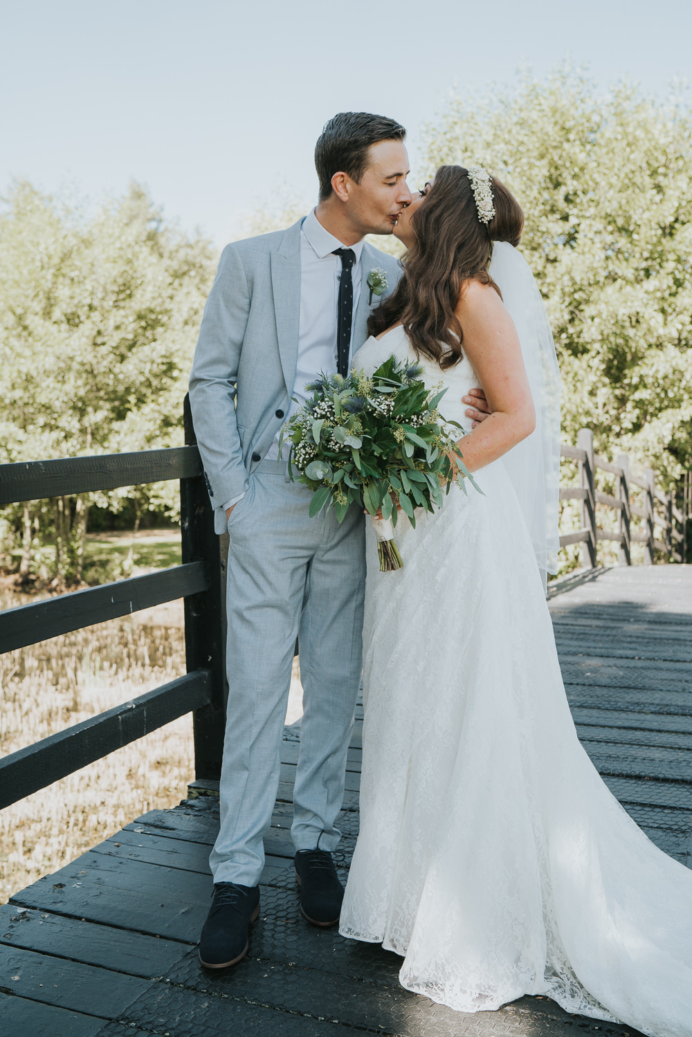 Intimate Outdoor Natural Relaxed Laid Back Summer Bride Groom Kiss Greenery Foliage Bouquet | Prested Hall Wedding Grace Elizabeth Photography