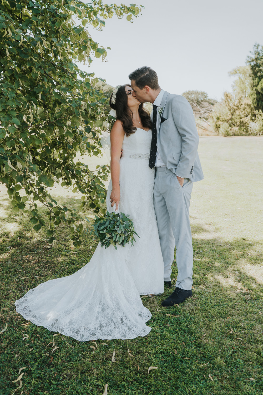 Intimate Outdoor Natural Relaxed Laid Back Summer Bride Groom Kiss Greenery Foliage Bouquet | Prested Hall Wedding Grace Elizabeth Photography