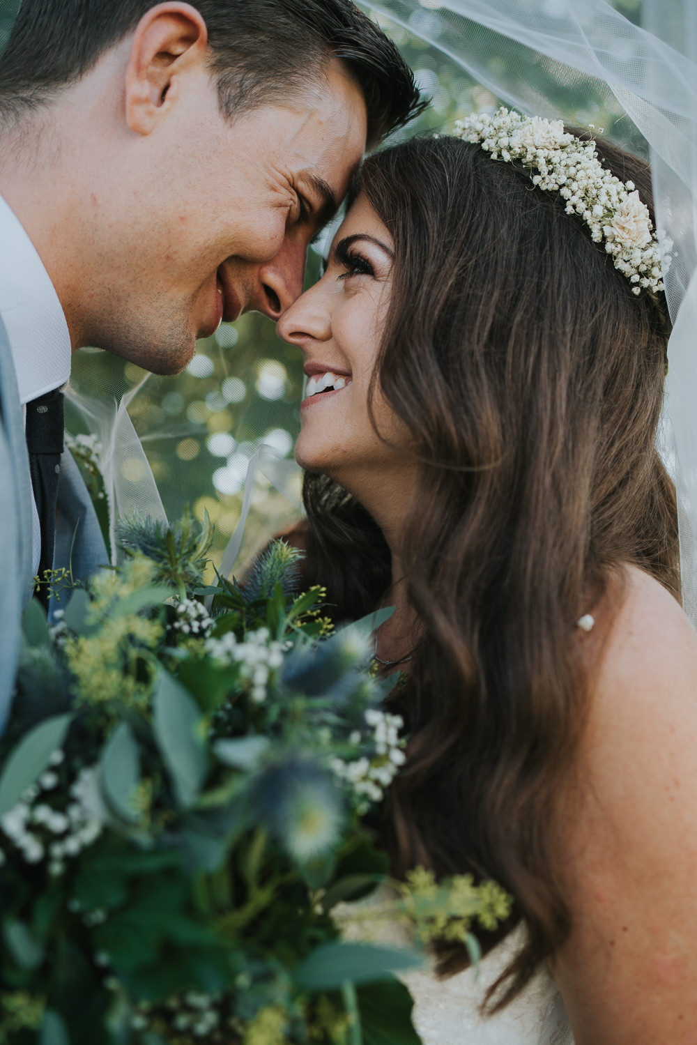Intimate Outdoor Natural Relaxed Laid Back Summer Bride Groom Kiss Greenery Foliage Bouquet Gypsophila Crown | Prested Hall Wedding Grace Elizabeth Photography