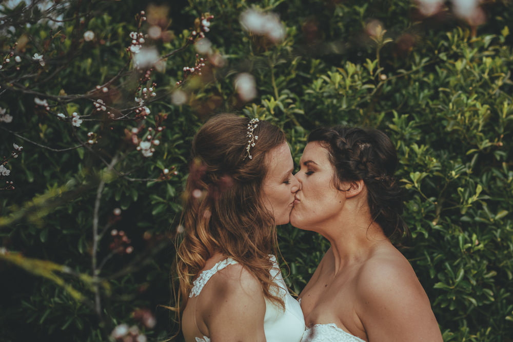 Bride Bridal Boat Neck Sweetheart Sleeveless Lace Illusion Button Detail Dress Gown Half Up Hair Plait Braid Wild Rustic Glam Sea Wedding Mr and Mrs Wedding Photography