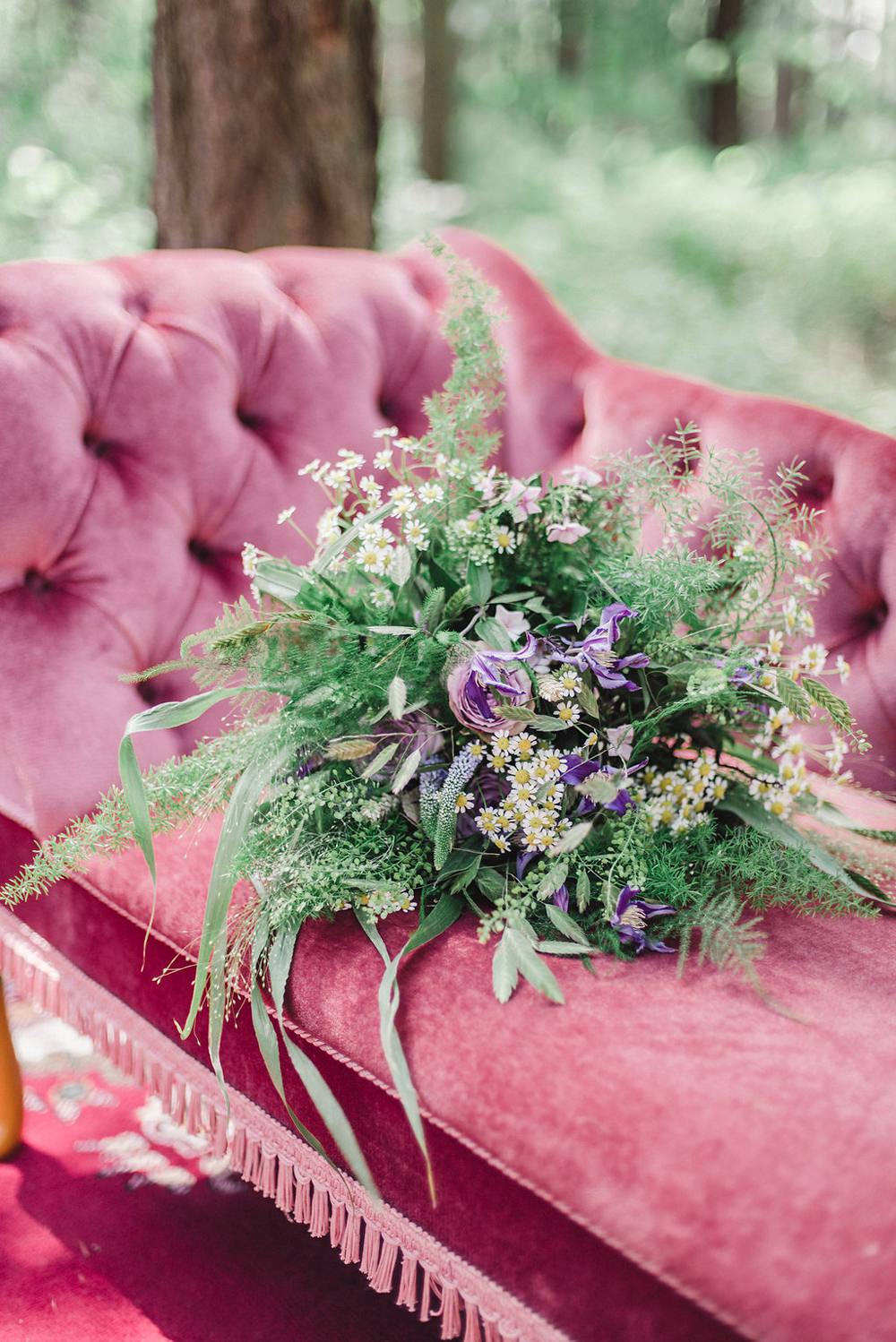 Velvet Chair Sofa Seat Bride Bridal Flowers Bouquet Greenery Foliage Purple Rose Daisy Wild Boho Woodland Wedding Ideas Camp Katur Emily Olivia Photography