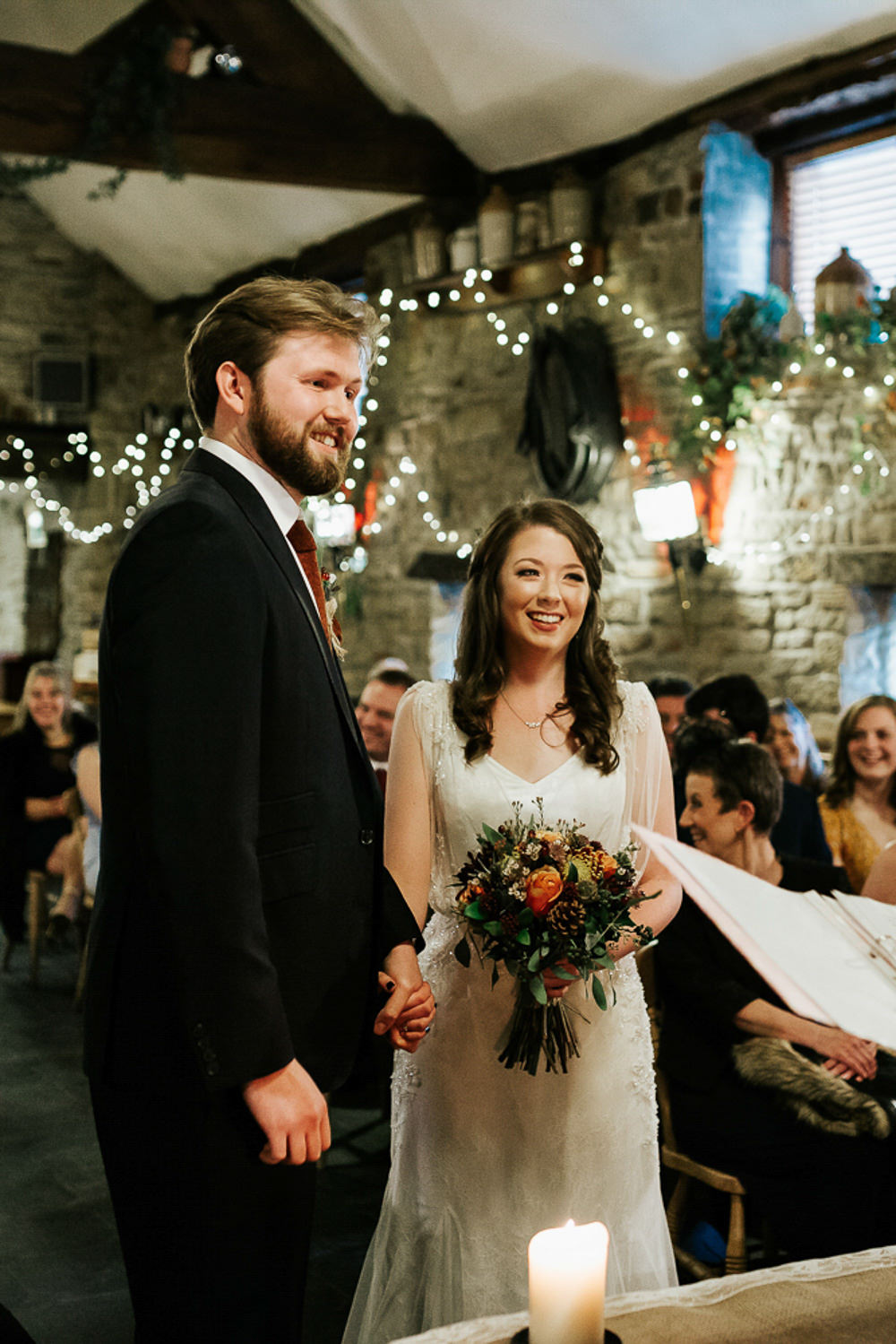 Bride Bridal Dress Cape Sleeve V Neck Lace Embellished Groom Burnt Orange Tie Black Suit Cubley Hall Wedding Photography by Charli