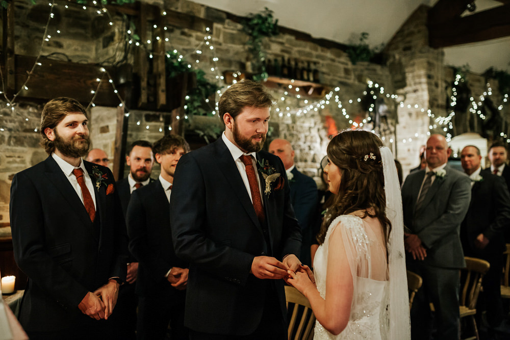 Bride Bridal Dress Cape Sleeve V Neck Lace Embellished Groom Burnt Orange Tie Black Suit Veil Cubley Hall Wedding Photography by Charli