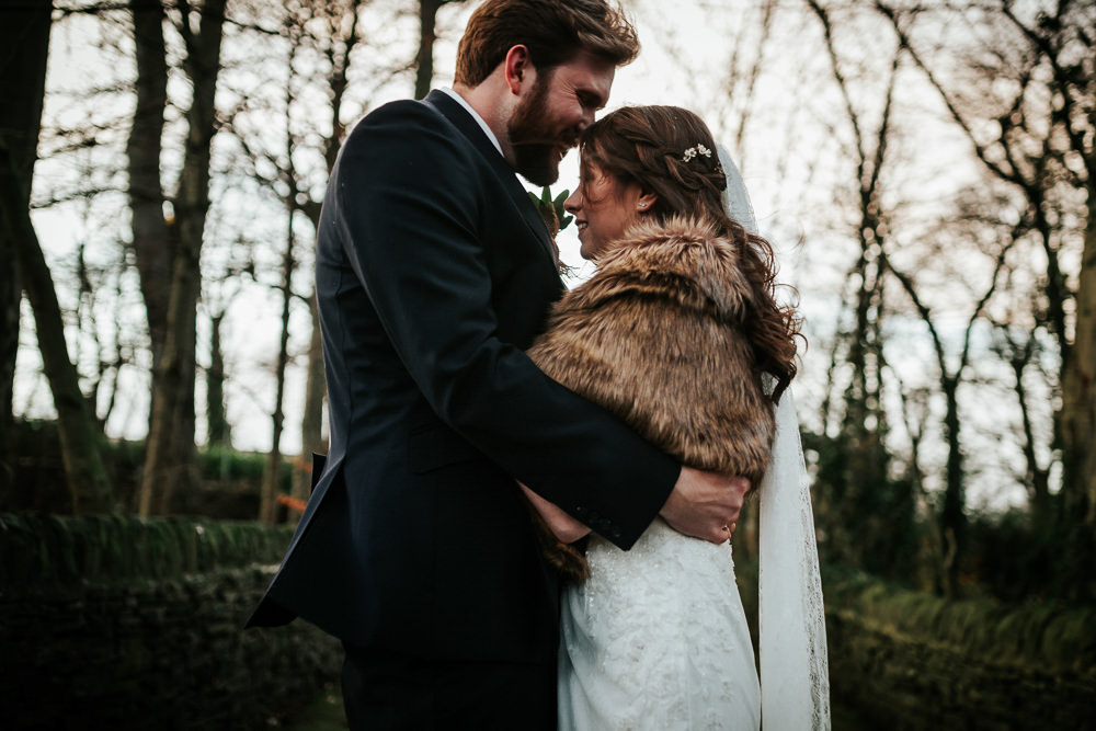Bride Bridal Dress Cape Sleeve V Neck Lace Embellished Groom Burnt Orange Tie Black Suit Fur Stole Cape Veil Cubley Hall Wedding Photography by Charli