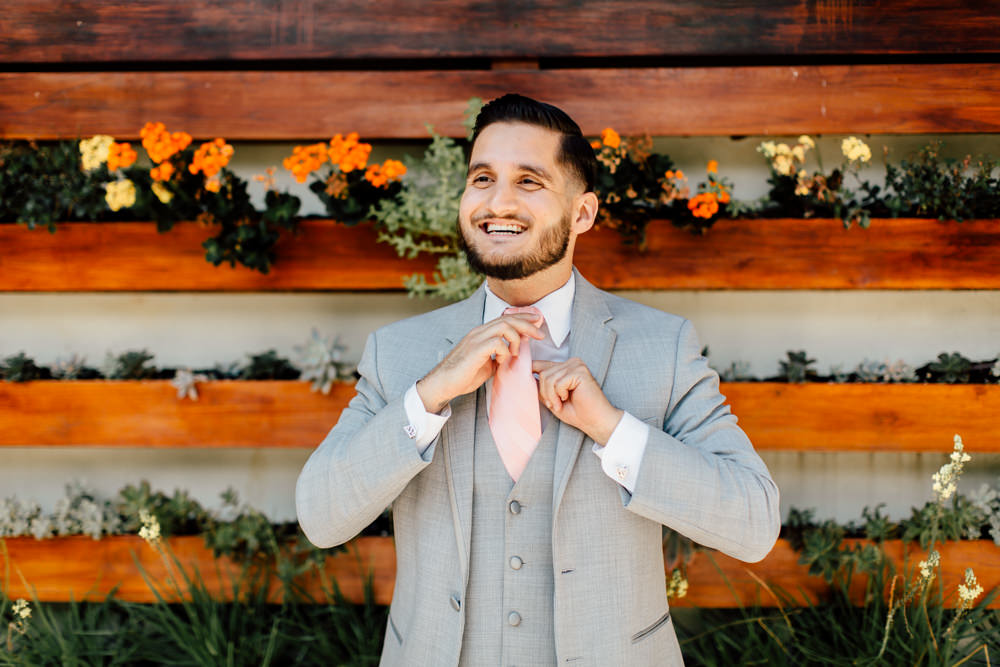 Grey Suit Groom Pink Tie Emotional Outdoor Wedding Laura Memory Photography