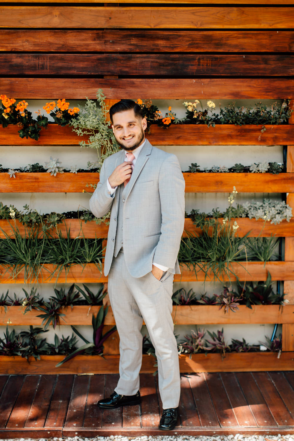 Grey Suit Groom Pink Tie Emotional Outdoor Wedding Laura Memory Photography