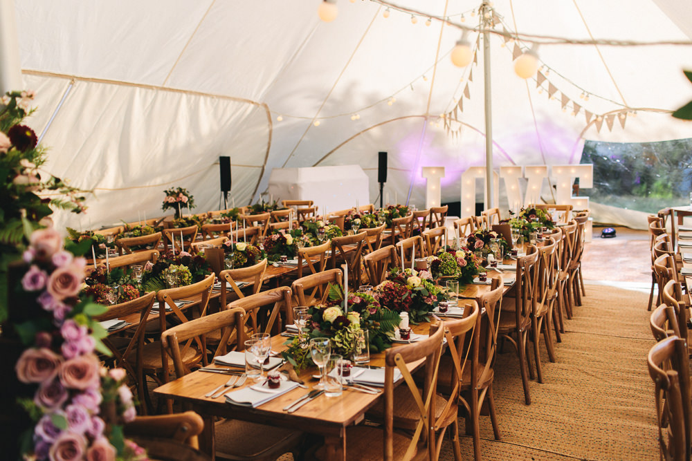 Wooden Cross Back Chairs Tables Stretch Tent Greenery Flowers Floral Farm Wedding Jessica O'Shaughnessy Photography