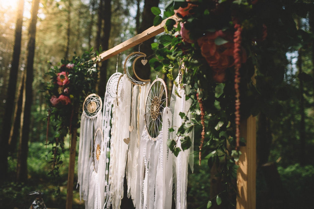 Ceremony Backdrop Wooden Frame Log Stumps Candles Persian Rug Aisle Dreamcatchers Flowers Bohemian Boho Free Spirited Wedding Ideas Woodland Lumiere Photographic